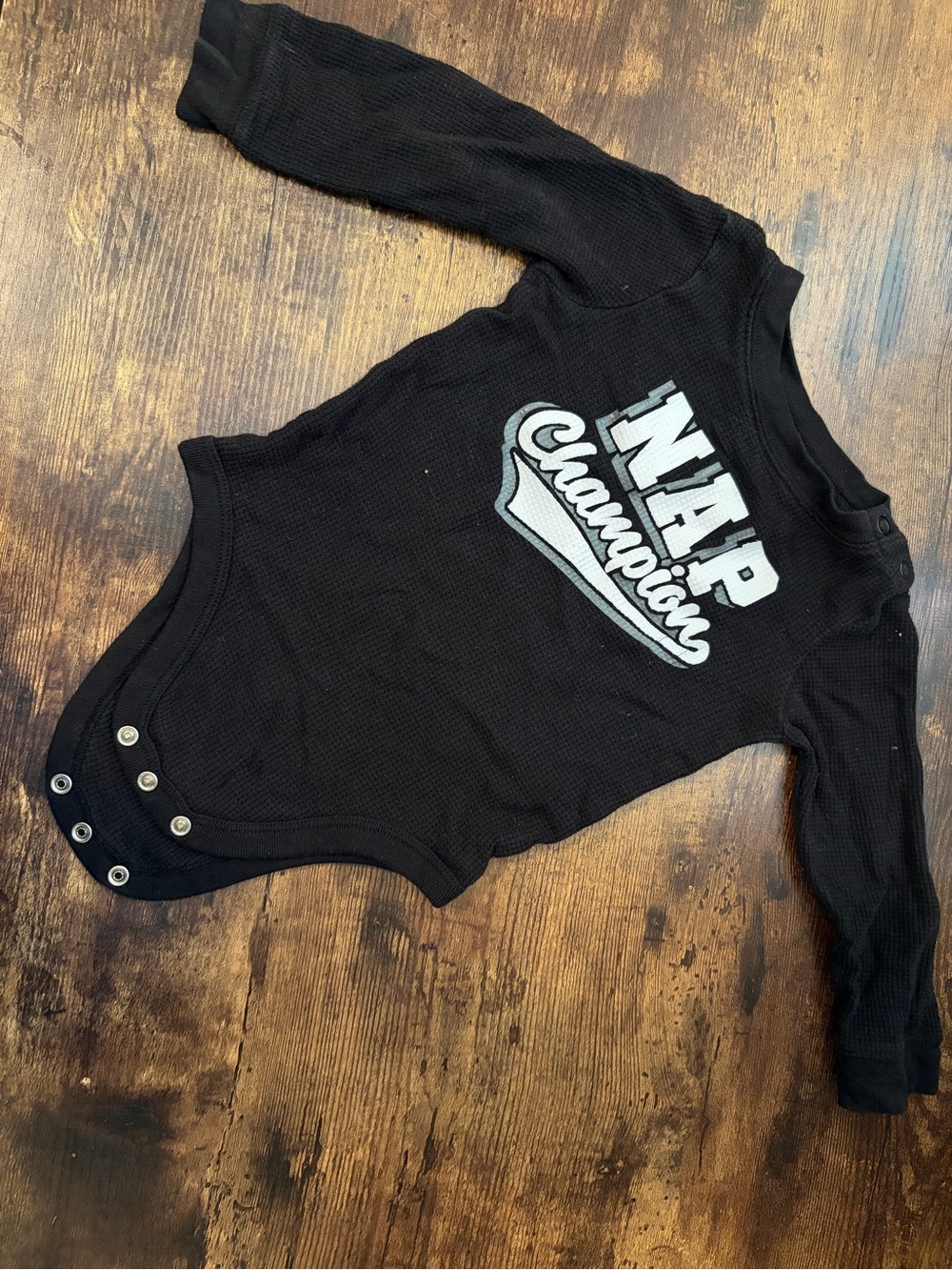 Champion Black Long-Sleeve 'NAP Champion' Baby Bodysuit